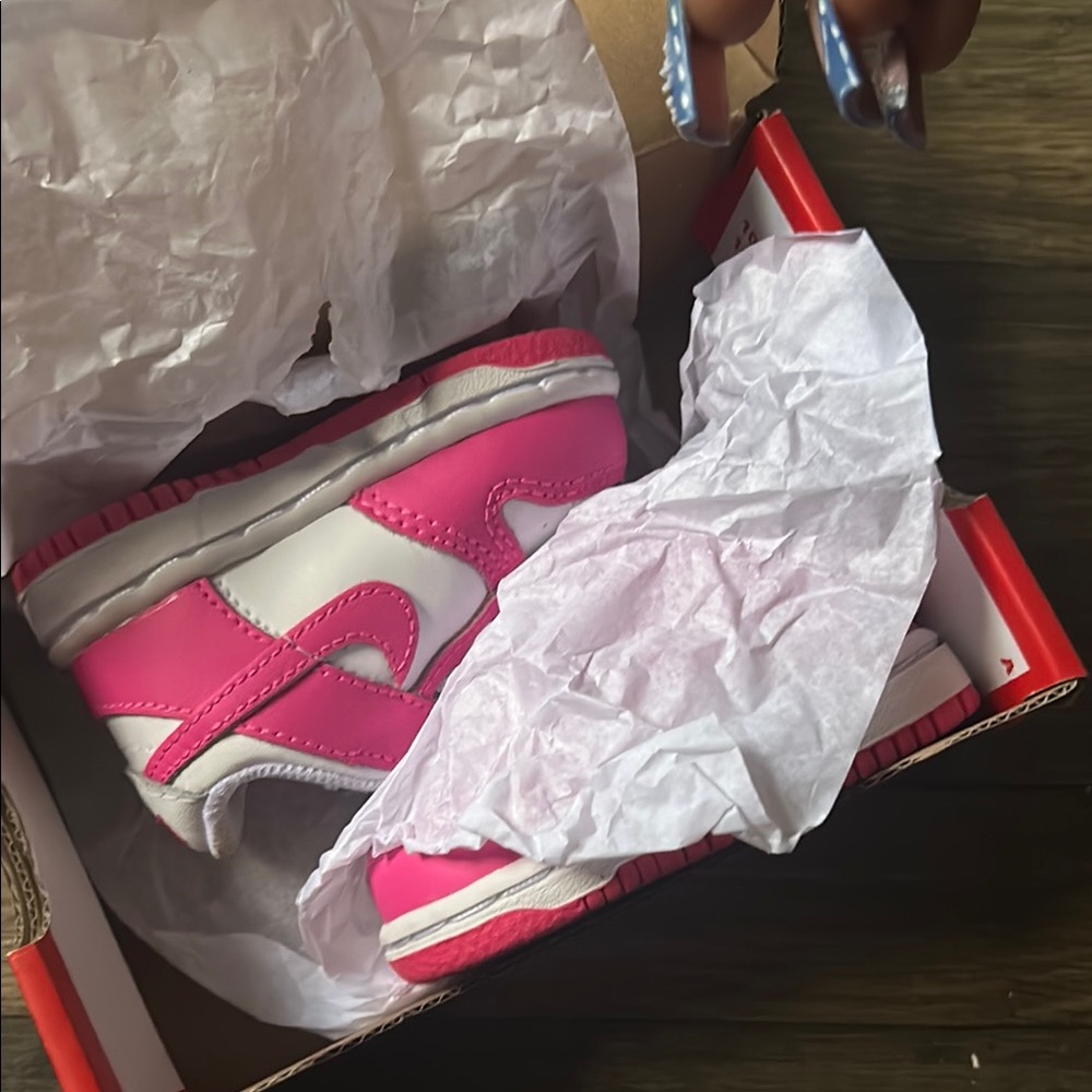 White and pink Nike dunk low